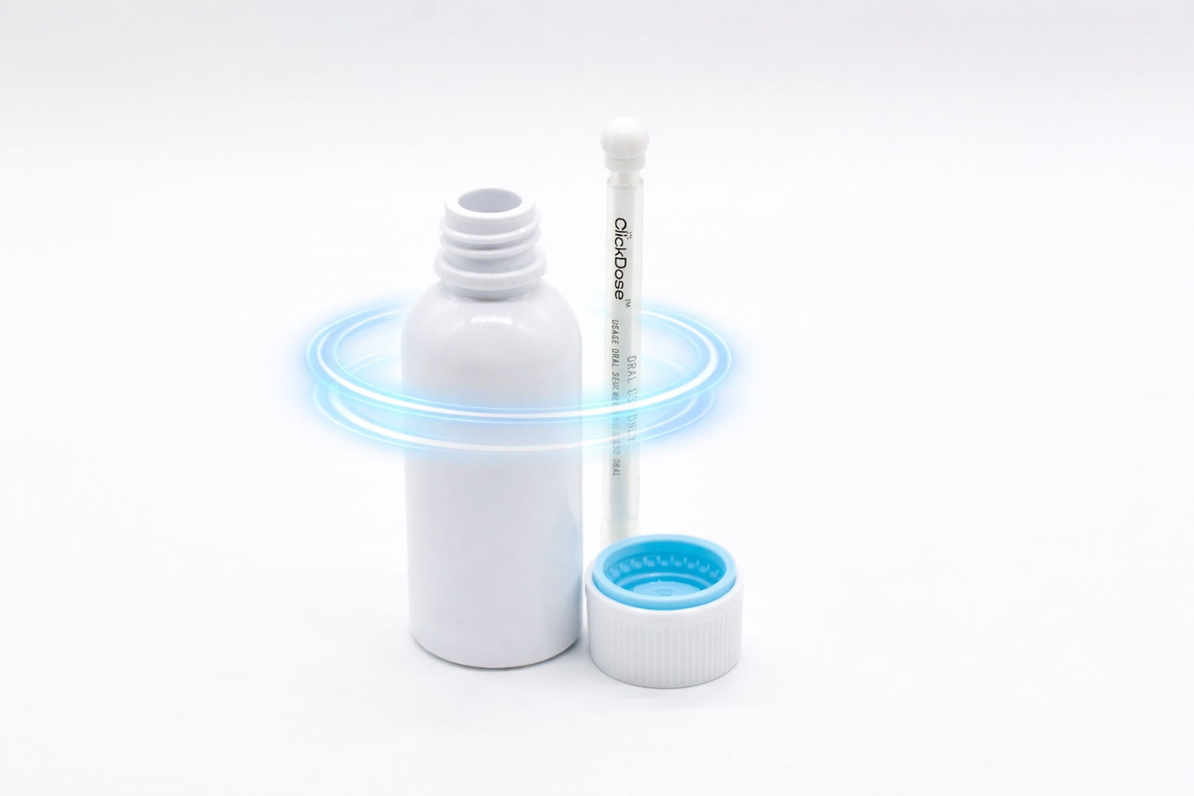 White plastic medicine bottle with detached blue child-resistant cap and ClickDose oral syringe placed beside it on a clean white background